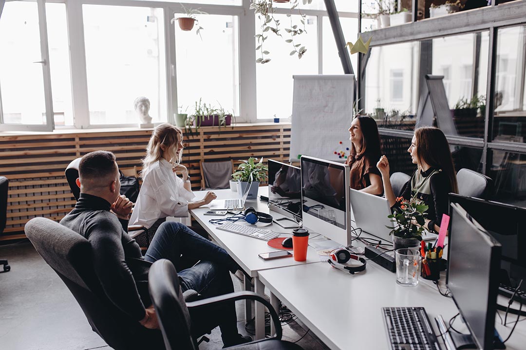 A group of specialists working on increasing revenues for their company's profit